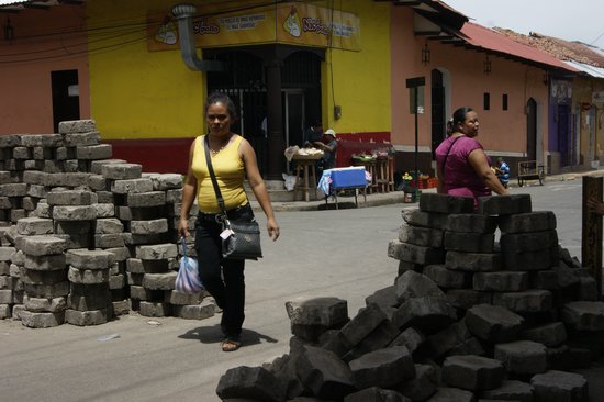 Life continues in the barricaded town of Leon